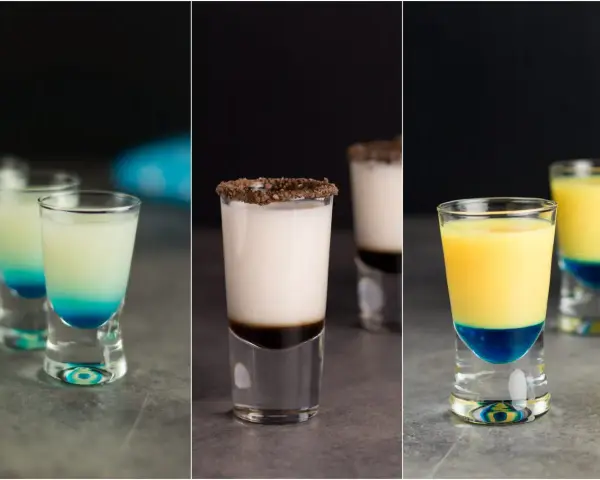Kolorowe shoty, w tym jeden przypominający małpi mózg, gotowe do degustacji.
